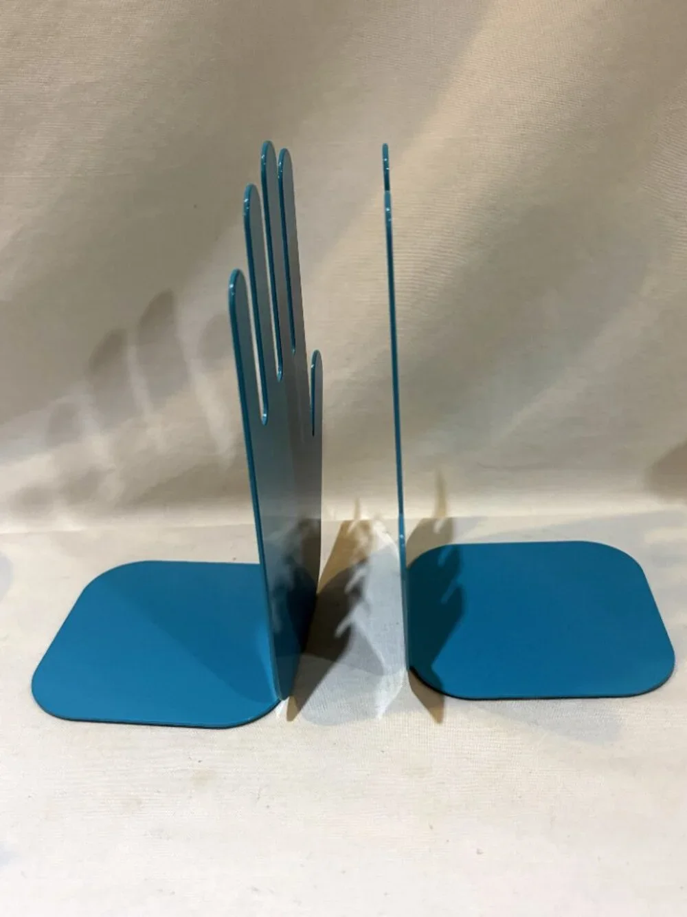 Pair of Jonathan Adler Teal Blue Metal Hands Bookends